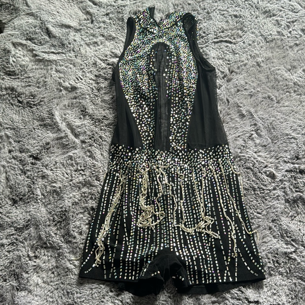Black romper with rhinestones and tassels